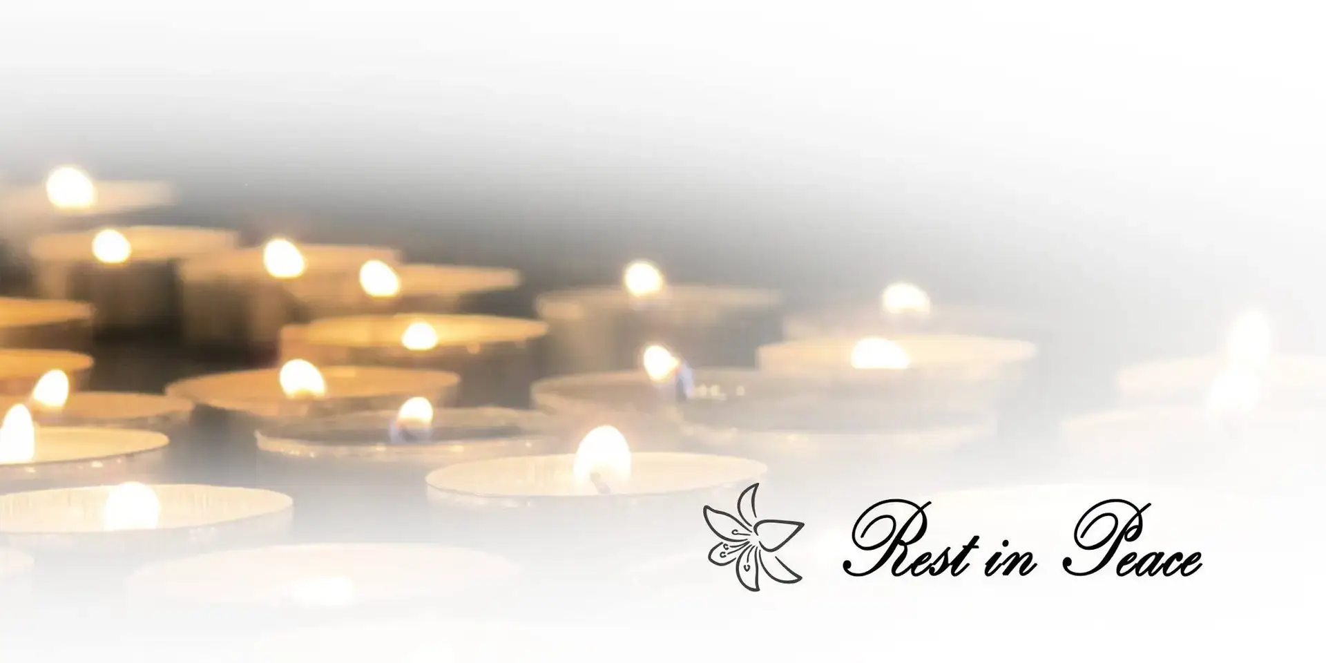 Blurred candlelight background with floral emblem, memorial banner design