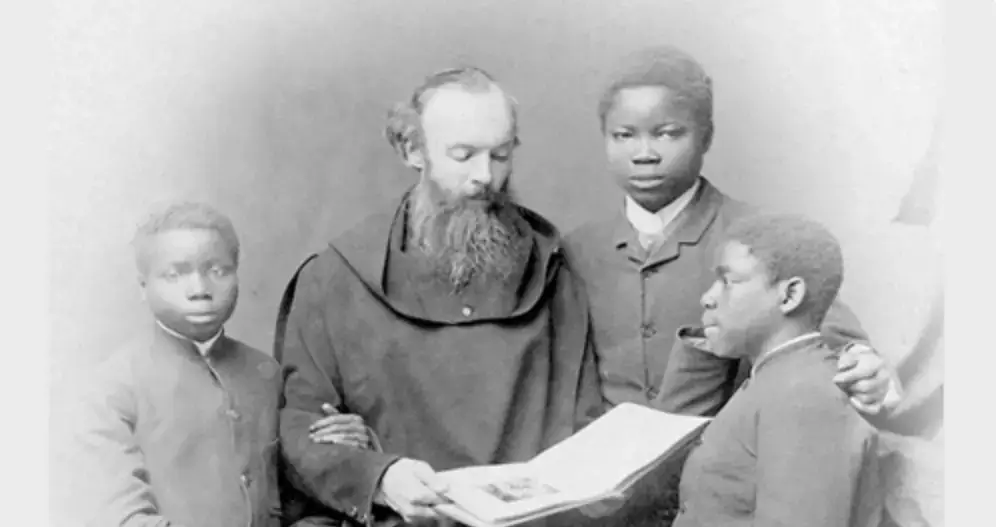 Vintage photo of friar and man reading document